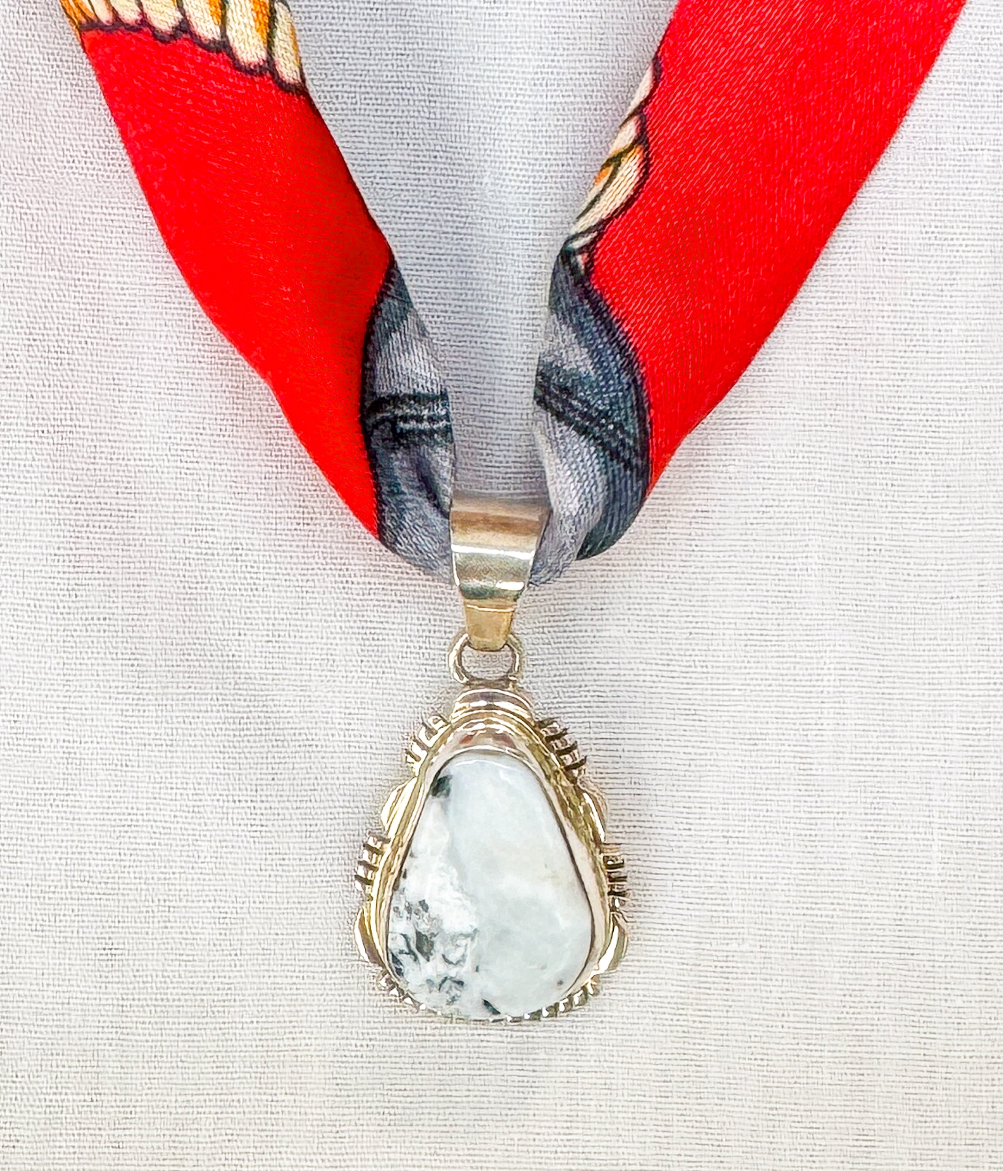 Trendy High Fashion White Buffalo Pendant on Silk Scarf Necklace